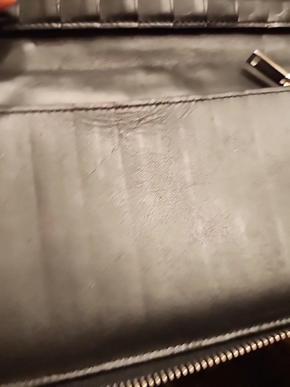 Saint Laurent studded zip-around long wallet made of black leather - Picture 13 of 16